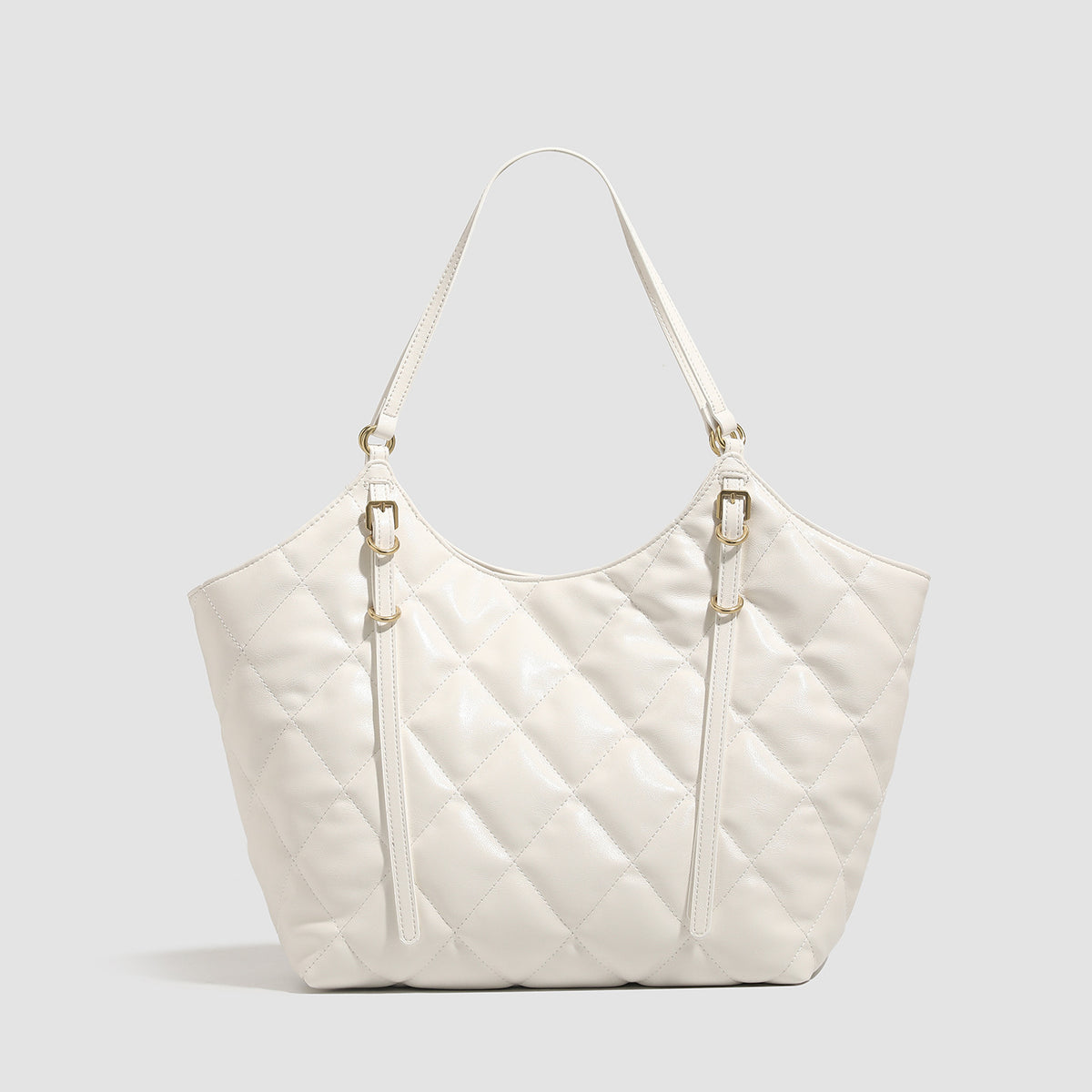 Large quilted diamond-pattern tote bag with glossy leather-look finish, dual flat shoulder straps, and gold-tone hardware
