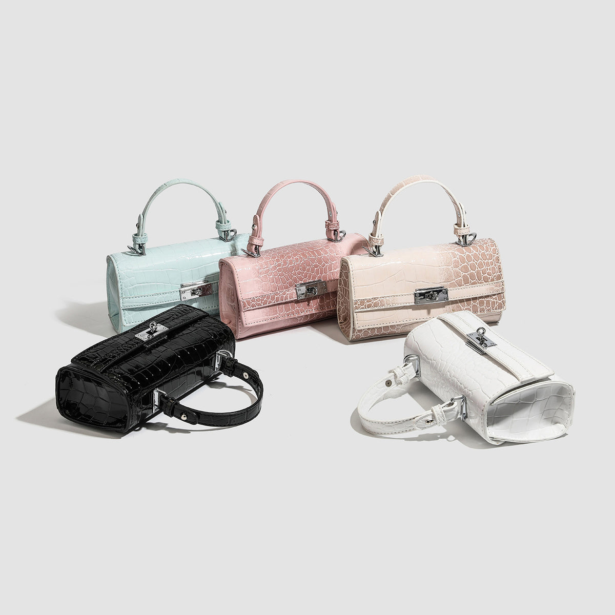 Mini structured rectangular handbag in glossy croc-embossed leather-look finish with silver-tone turn-lock closure, short