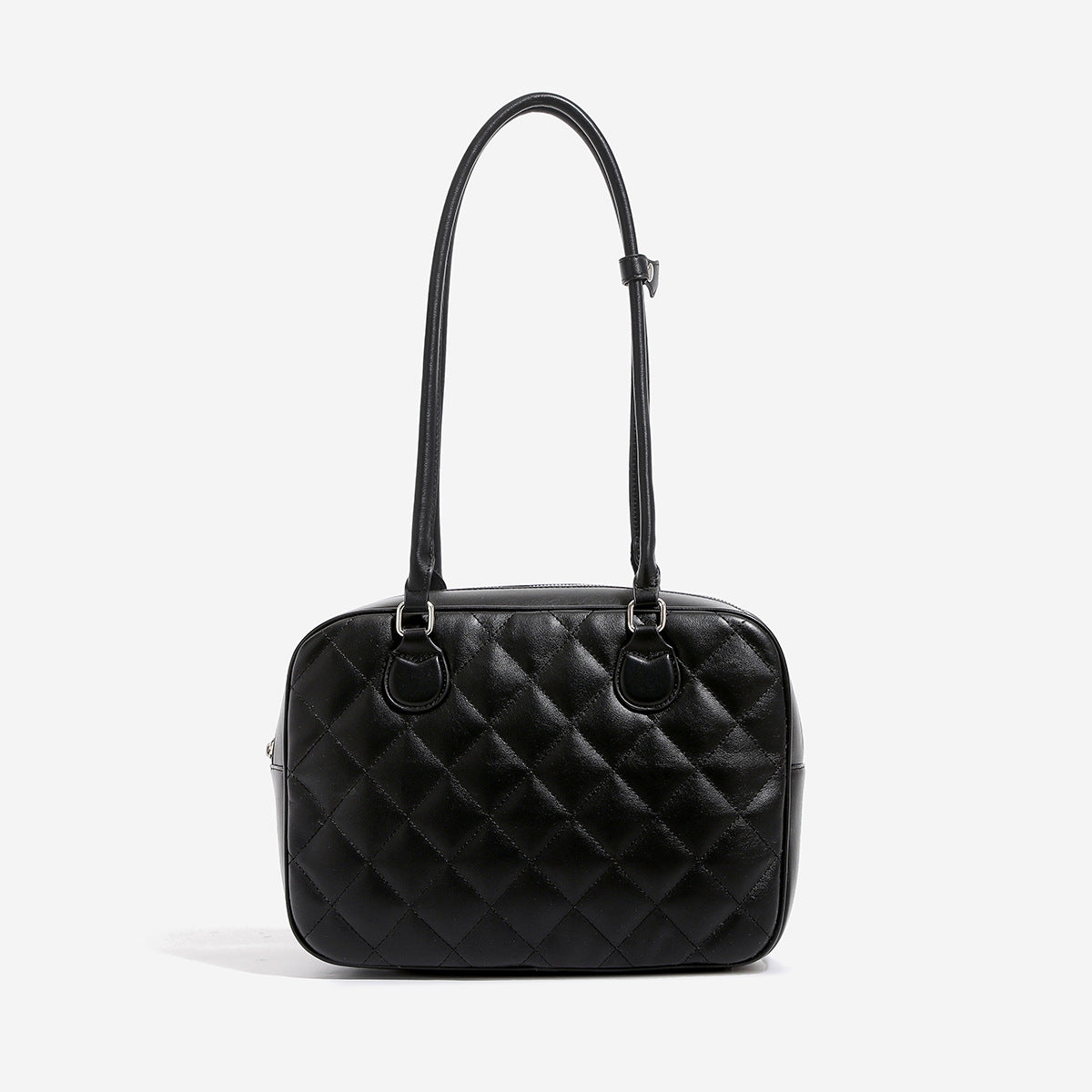 Structured diamond-quilted bowling shoulder bag with silver-tone hardware and top zip closure, front view