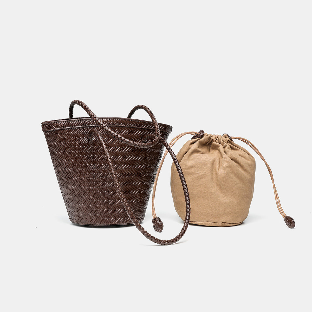 Woven herringbone-texture bucket bag with braided rope shoulder strap in dark brown, detail view 3