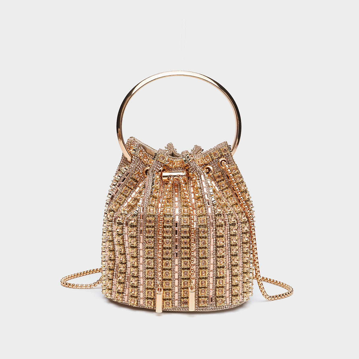 Mini crystal rhinestone bucket bag with circular ring top handle, drawstring closure, and silver chain shoulder strap, detail