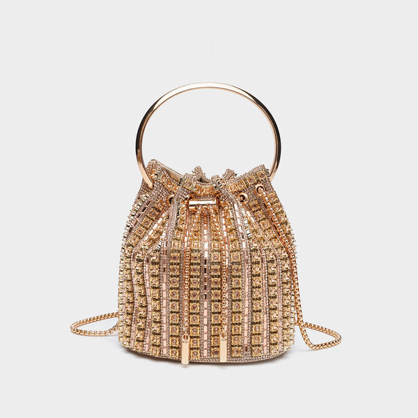 Mini crystal rhinestone bucket bag with circular ring top handle, drawstring closure, and silver chain shoulder strap, detail