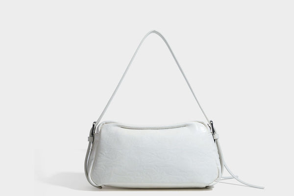 Compact black crinkled leather-look baguette shoulder bag with gold-tone arch hardware and adjustable strap, detail view 23