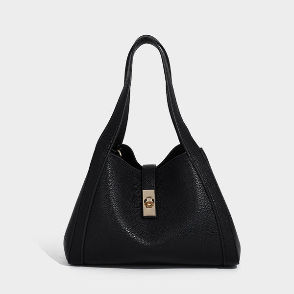 Structured trapezoid tote bag in taupe pebbled leather-look finish with gold-tone turn-lock hardware, dual top handles, and