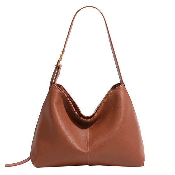 Soft pebbled leather-look hobo shoulder bag with crescent dipped opening, central seam, and adjustable strap, detail view 5