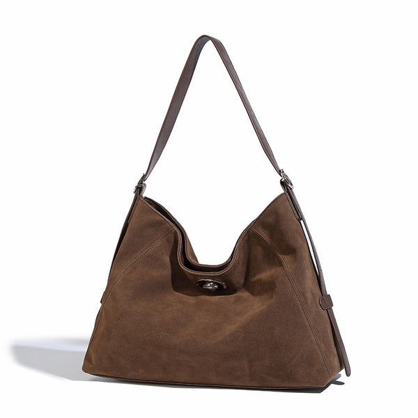 Slouchy hobo shoulder bag with turn-lock flap closure and adjustable strap, detail view 5