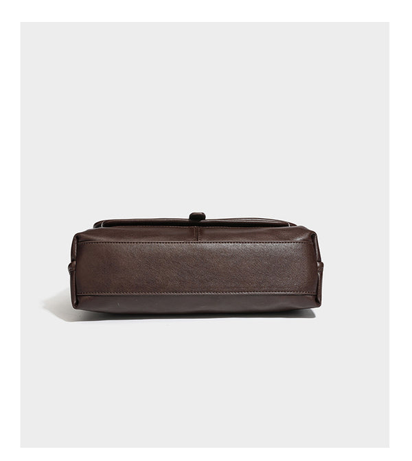 Structured rectangular satchel bag in dark espresso brown with smooth leather-look finish, flap front with silver turn-lock