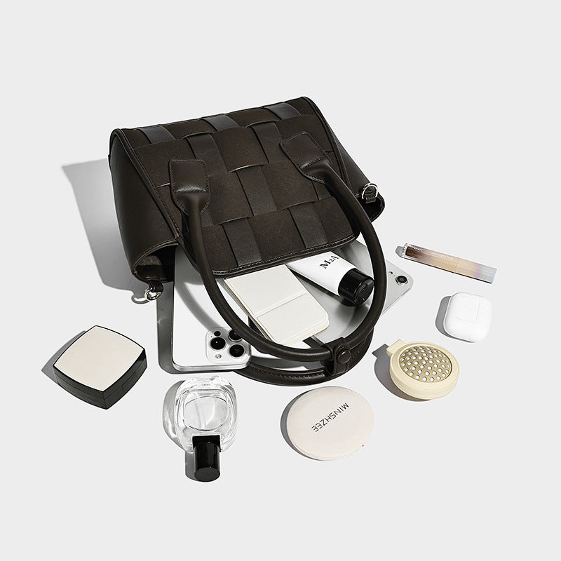 Small structured woven-panel mini tote bag with double top handles and detachable crossbody strap in matte leather-look