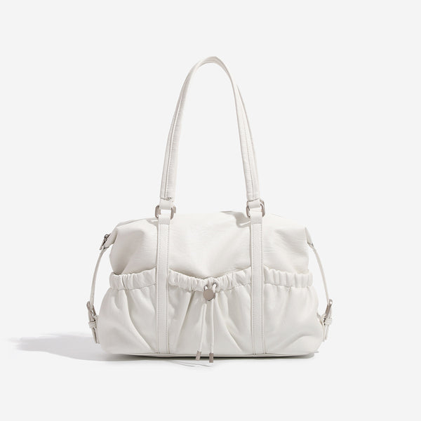 Ivory leather-look shoulder bag with ruched front panels, drawstring toggle, silver-tone hardware, and dual top handles