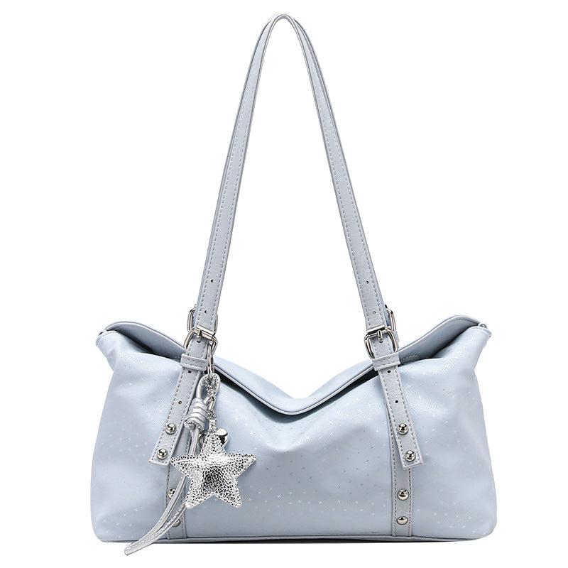 Slouchy leather-look shoulder tote bag with star charm pendant, silver-tone rivets and buckles, detail view 5