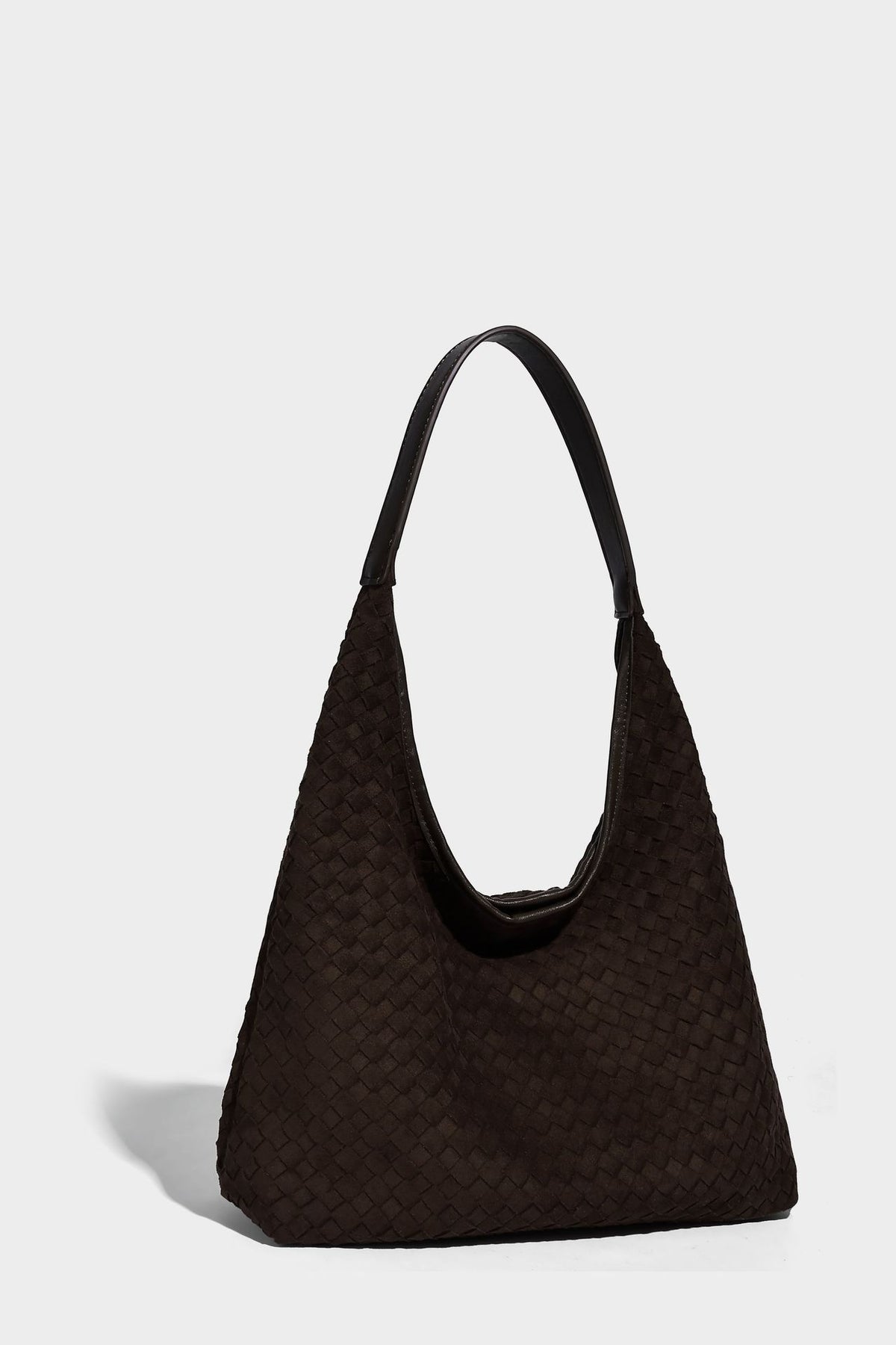 Large slouchy woven hobo tote bag with curved shoulder strap and triangular silhouette, detail view 13