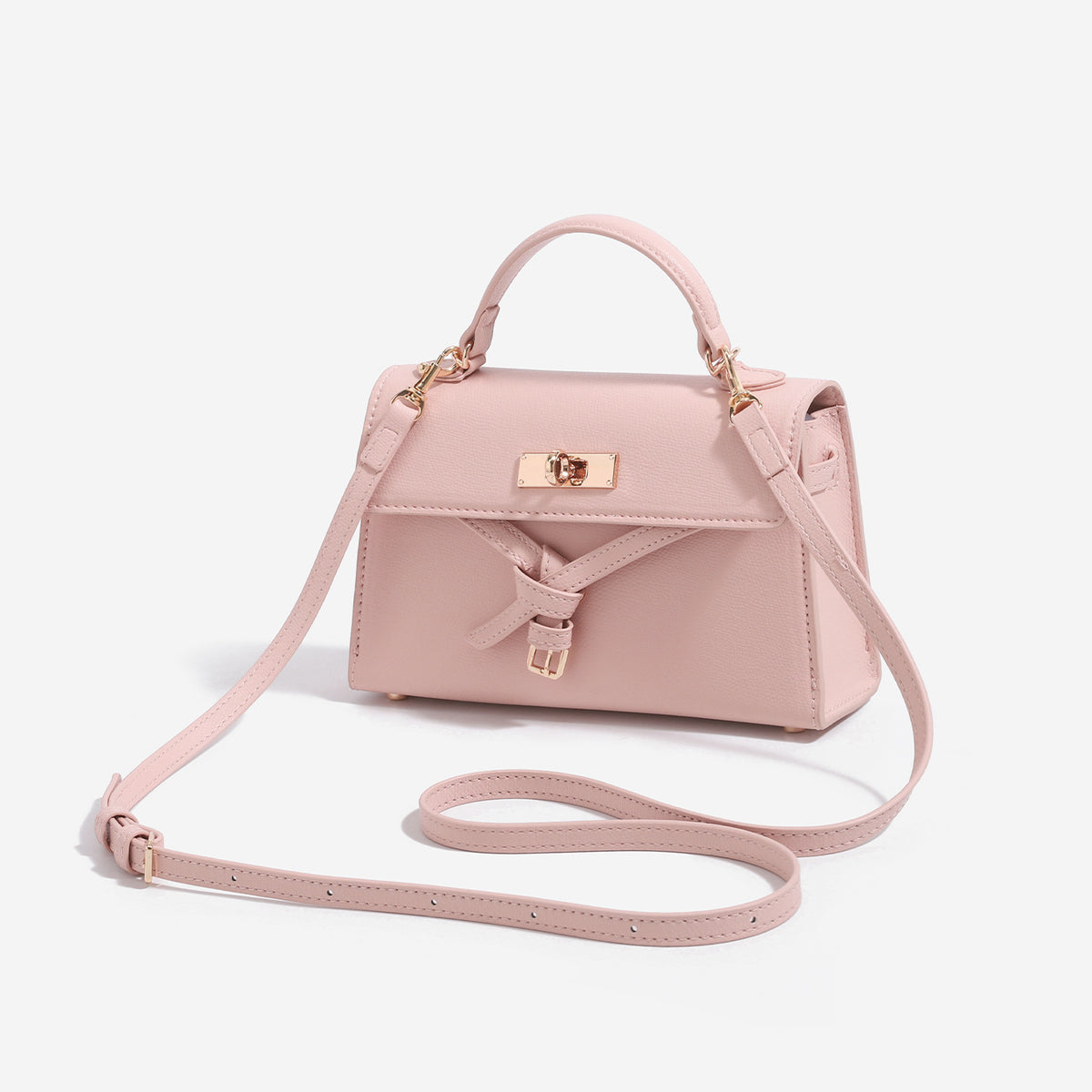 Strukturierte Mini-Henkeltasche mit genarbter matter Oberfläche, Drehverschluss in Goldoptik, schleifenförmigem Riemendetail und kurzem Henkel