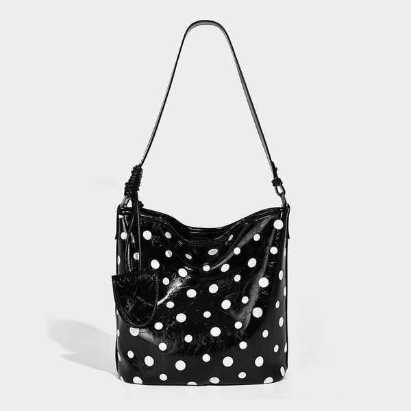 Glossy crinkled polka-dot bucket hobo bag with adjustable crossbody strap and side pouch, detail view 6