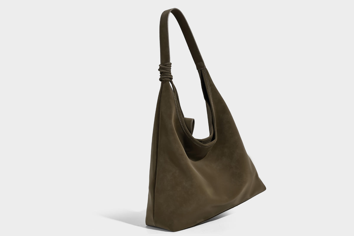 Slouchy oversized matte suede-look shoulder tote bag with knotted strap and attached front flap pouch, detail view 15