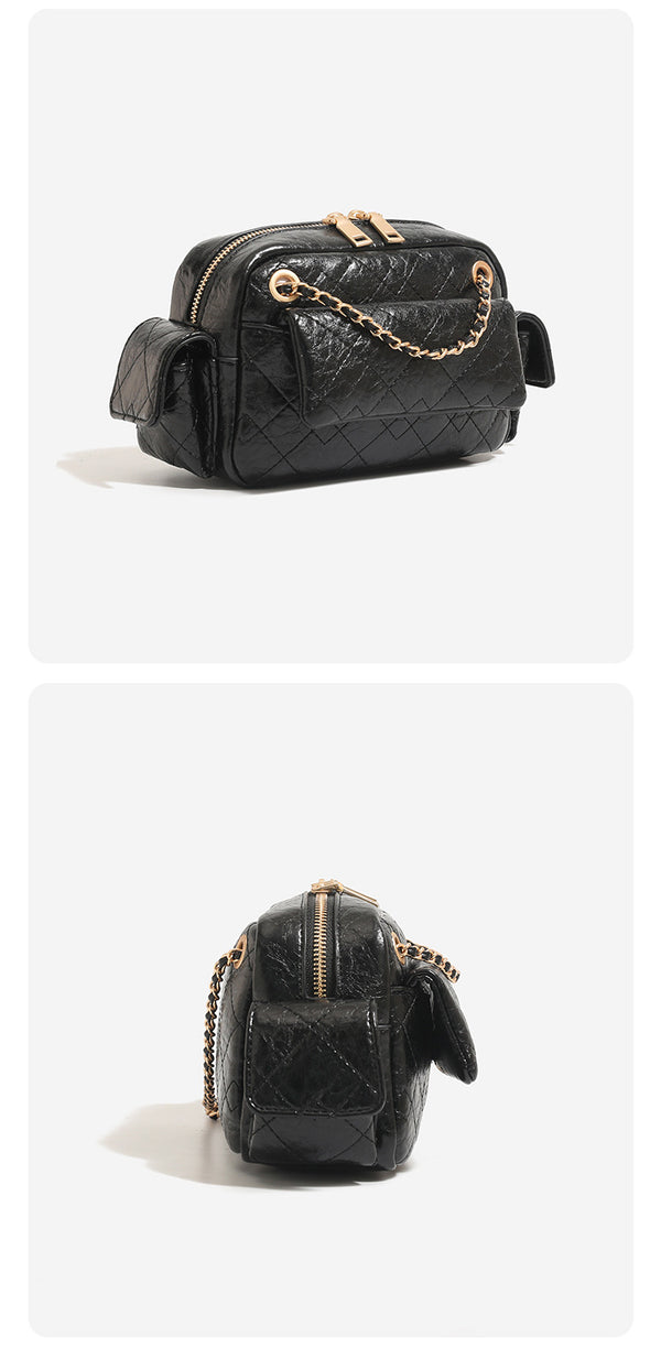 Compact quilted leather-look crossbody bag with gold-tone chain strap and double zip closure, detail view 13