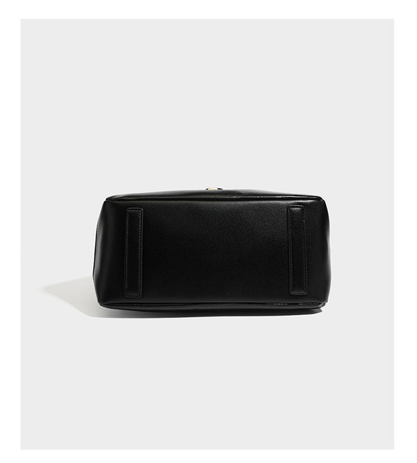 Black glossy crinkled leather-look convertible shoulder tote bag with gold gourd-shaped emblem hardware and detachable
