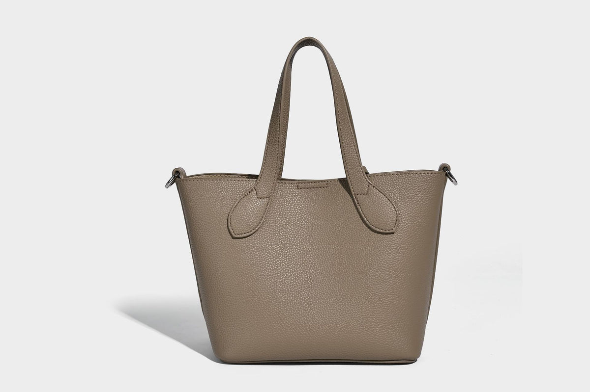 Compact pebbled bucket tote bag with elephant charm, twin top handles, and detachable crossbody strap, detail view 19