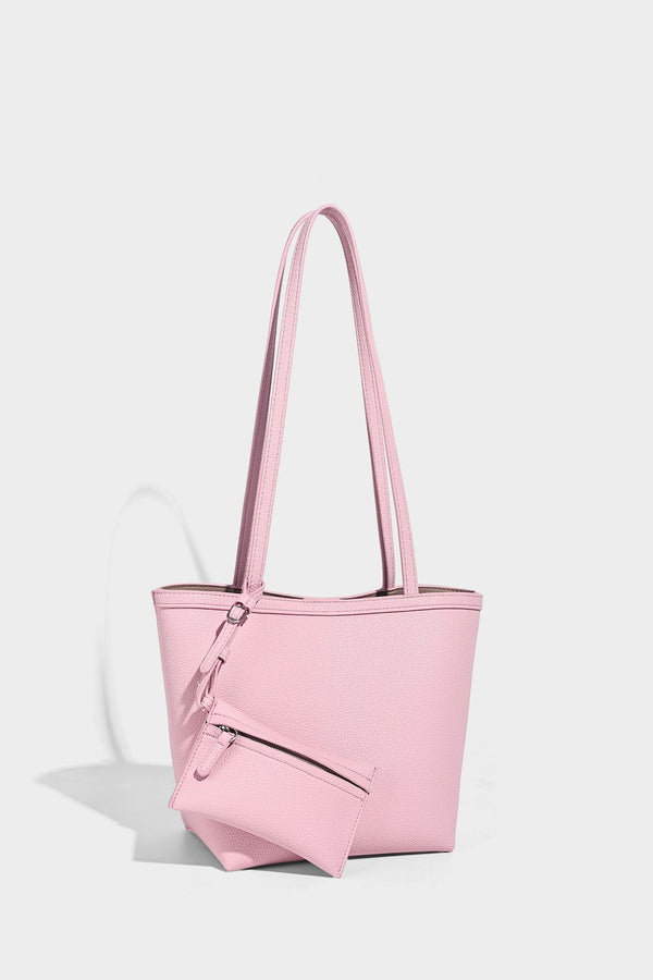 Structured pebbled leather-look tote bag in taupe with long shoulder strap, detachable zip pouch, and pink tulip flower