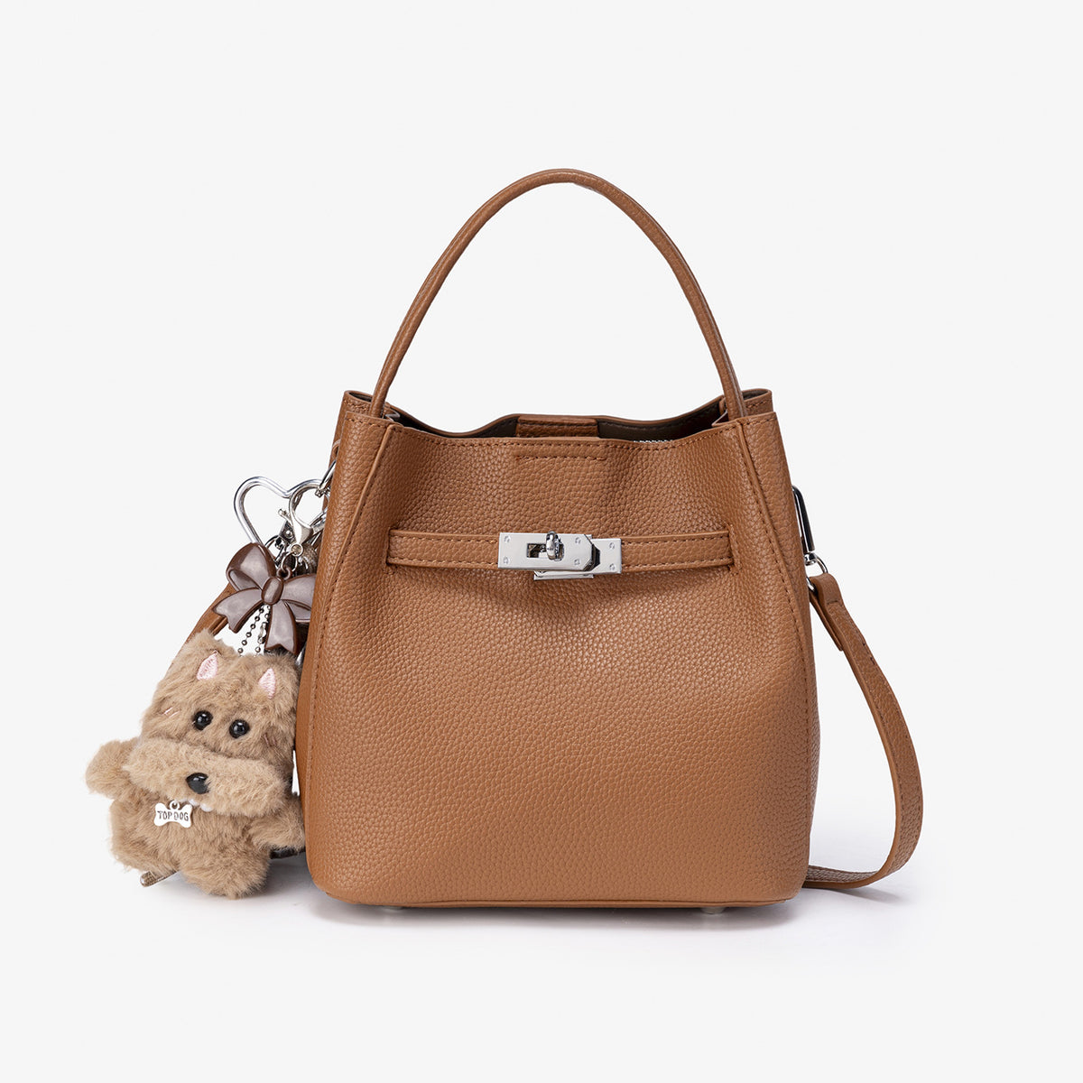 Compact structured bucket bag in pebbled leather-look finish with silver turn-lock front clasp, dual top handles, detachable