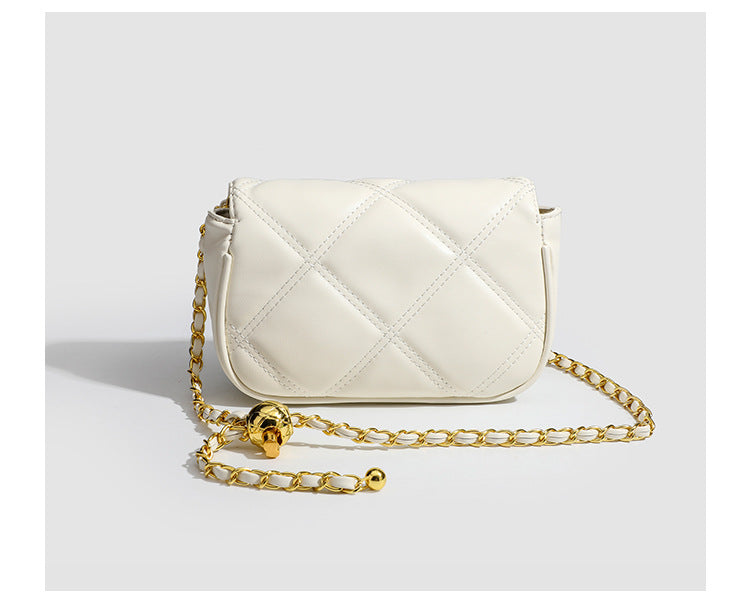 Compact diamond-quilted mini crossbody bag with gold-tone turn-lock closure and woven chain strap, detail view 10