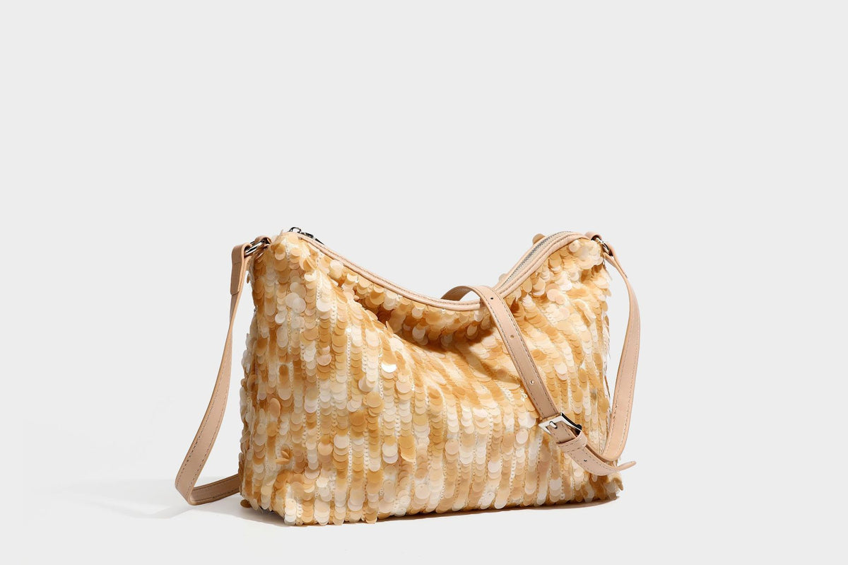 Slouchy paillette sequin hobo shoulder bag with zip closure and adjustable leather-look strap with silver chain hardware