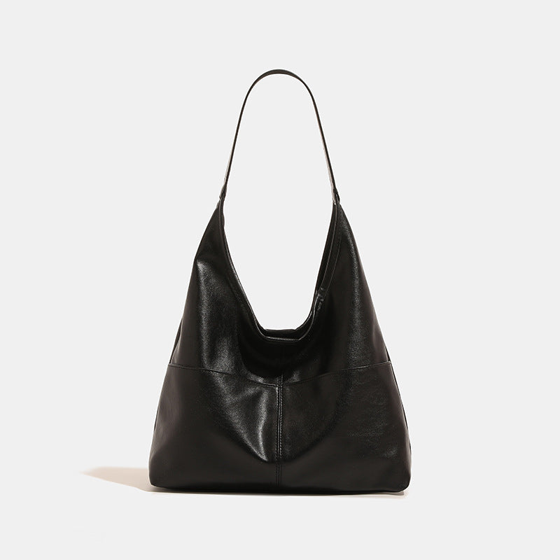 Oversized slouchy hobo tote bag in dark brown smooth matte leather-look finish with long flat shoulder strap and panelled