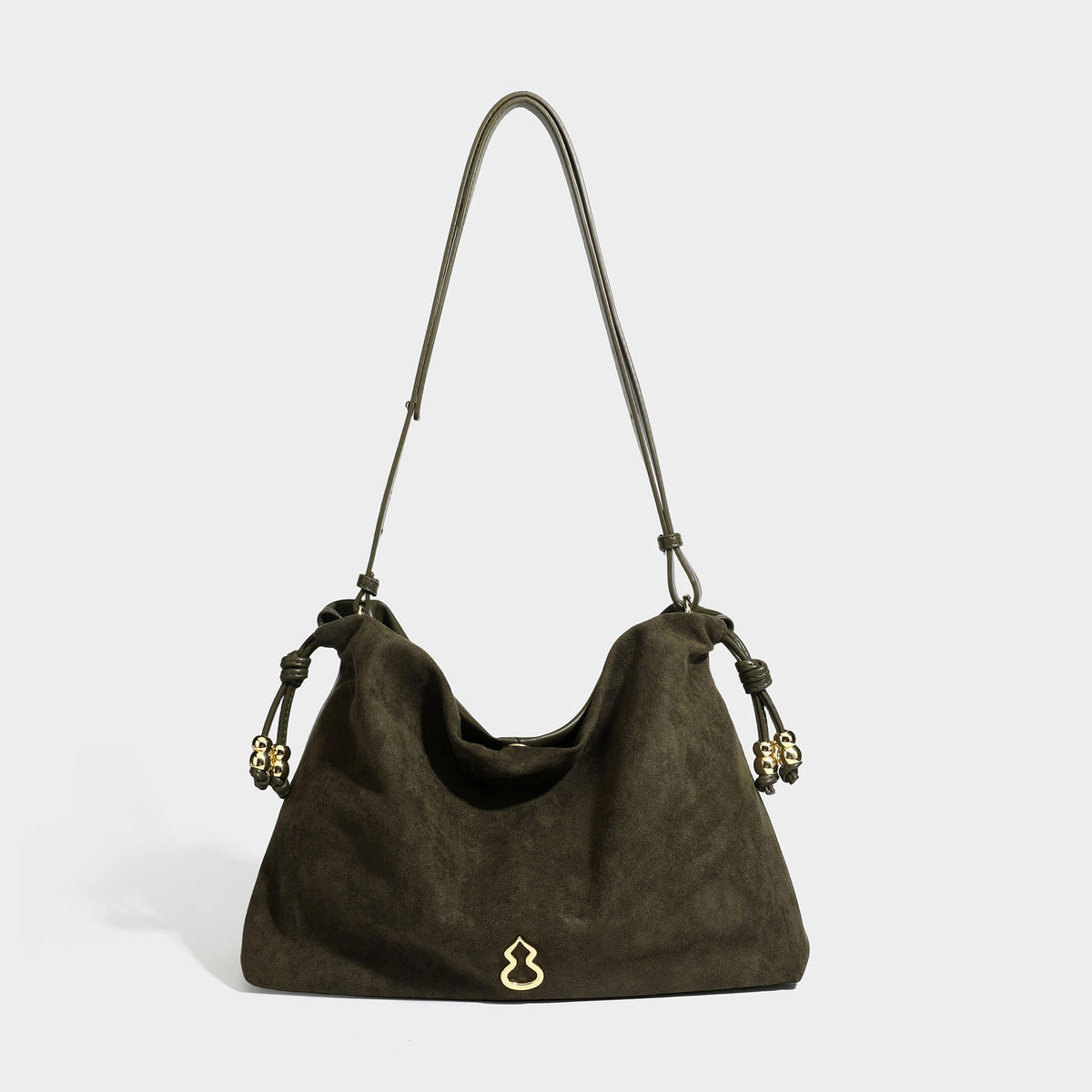 Suede-look drawstring shoulder bag in brown with smooth trim, knotted bead drawstring closure, slim adjustable strap, and