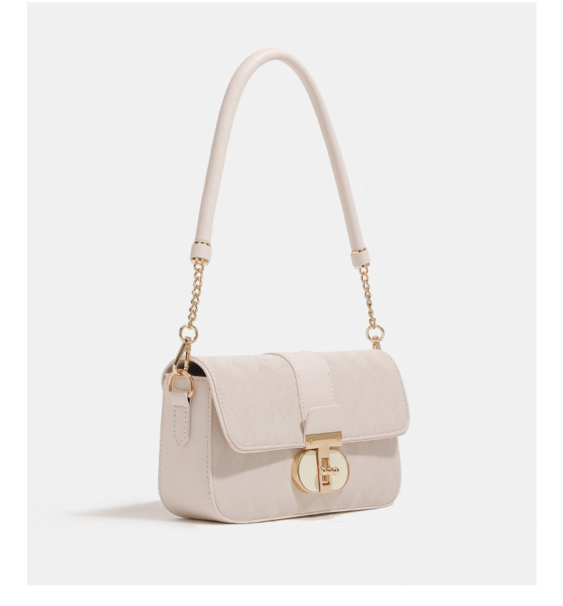 Compact rectangular quilted flap crossbody bag with gold-tone turn-lock closure and chain strap, detail view 14