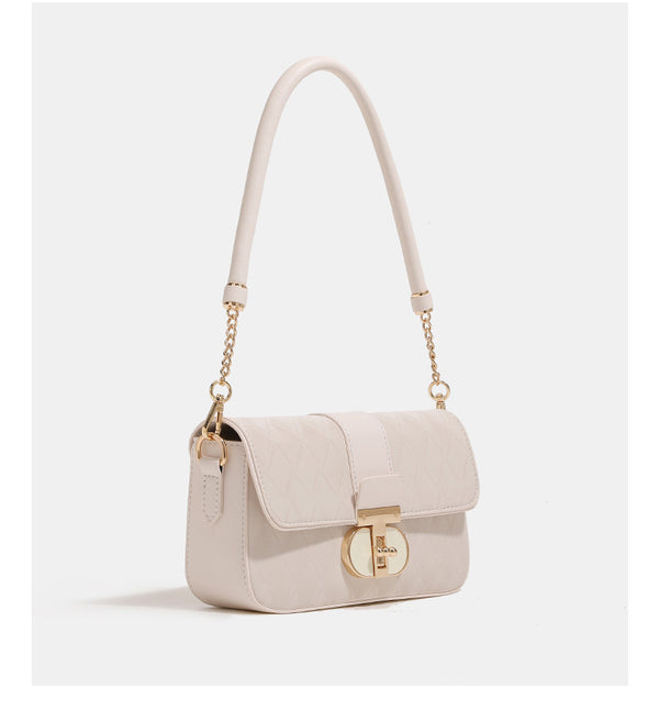 Compact rectangular quilted flap crossbody bag with gold-tone turn-lock closure and chain strap, detail view 14
