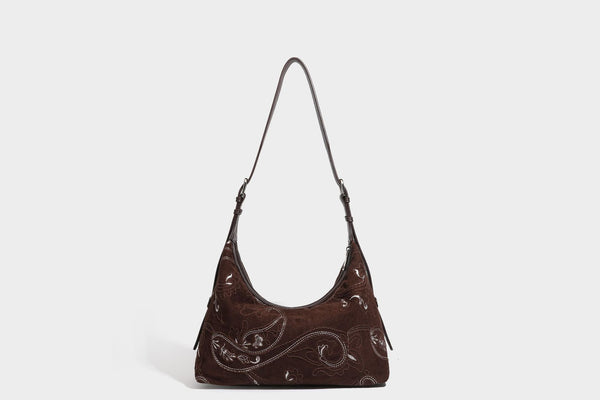 Deep chocolate suede-look hobo shoulder bag with tonal paisley floral embroidery, smooth dark leather-look trim, top zip