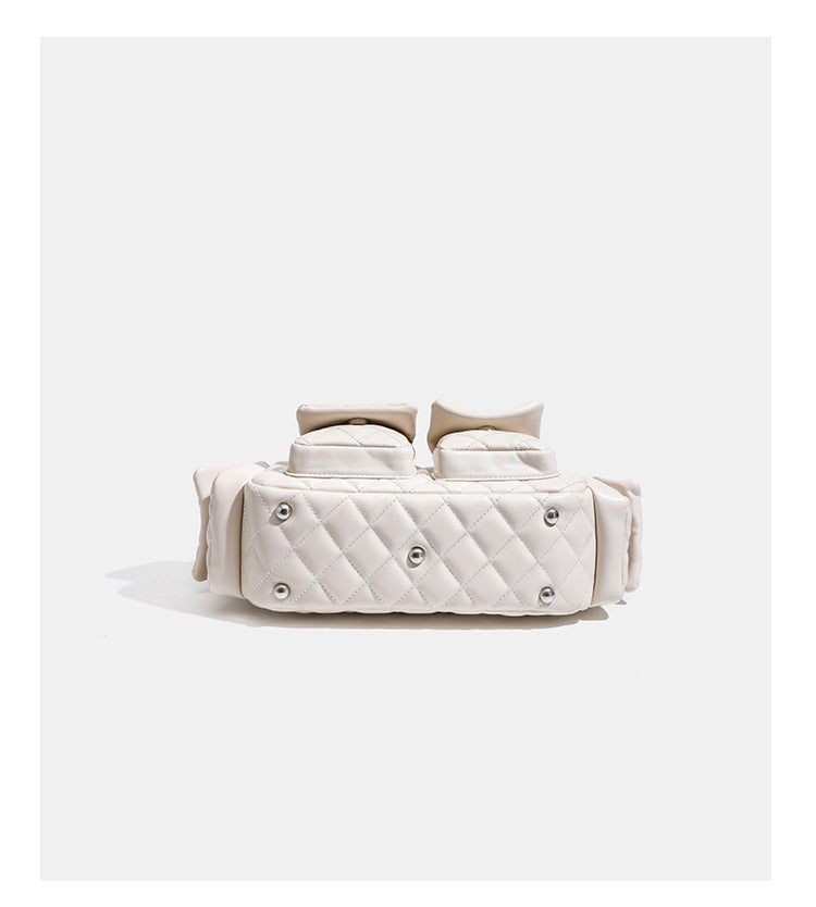 Off-white quilted leather-look hobo shoulder bag with diamond stitching, chain-and-strap handle, two front flap pockets