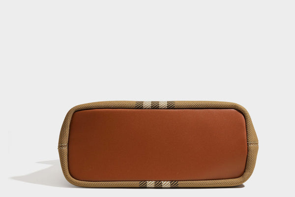 Large structured plaid check tote bag with smooth tan leather-look shoulder straps, attached front zip pouch, and gold-tone