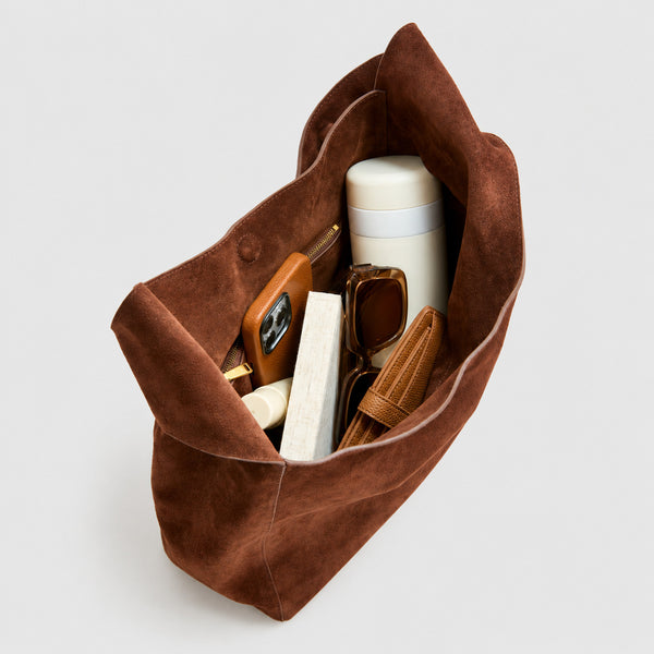 Large slouchy hobo shoulder bag in brushed suede-like finish with single flat strap and unstructured body, detail view 3