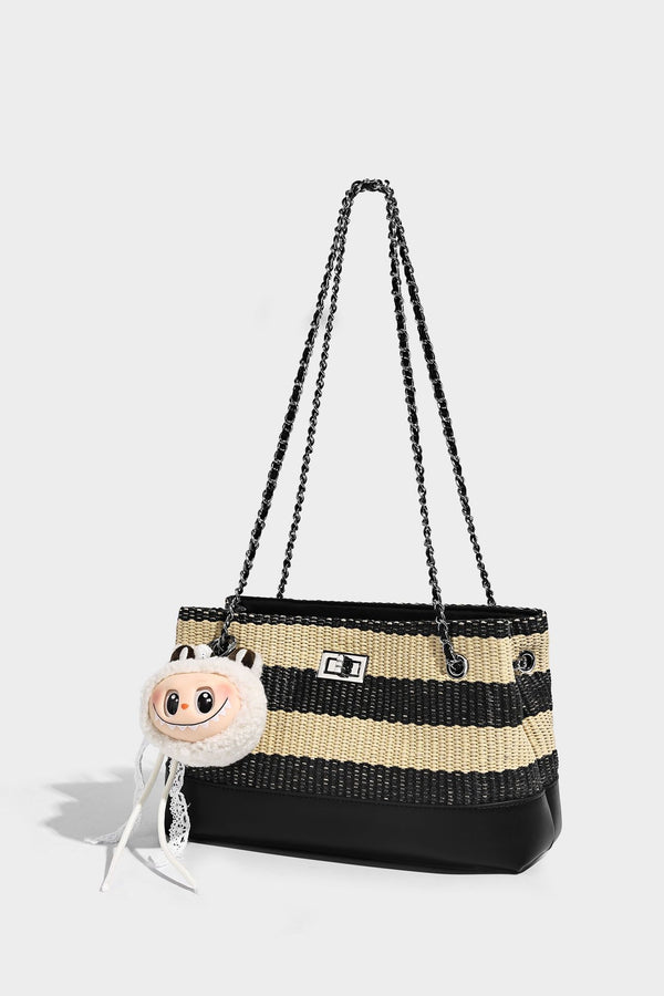 Structured black and beige striped woven shoulder bag with silver chain strap and turn-lock metal clasp, detail view 13