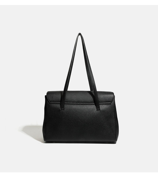 Structured black pebbled-finish flap tote bag with silver turn-lock clasp and long double shoulder straps, detail view 8