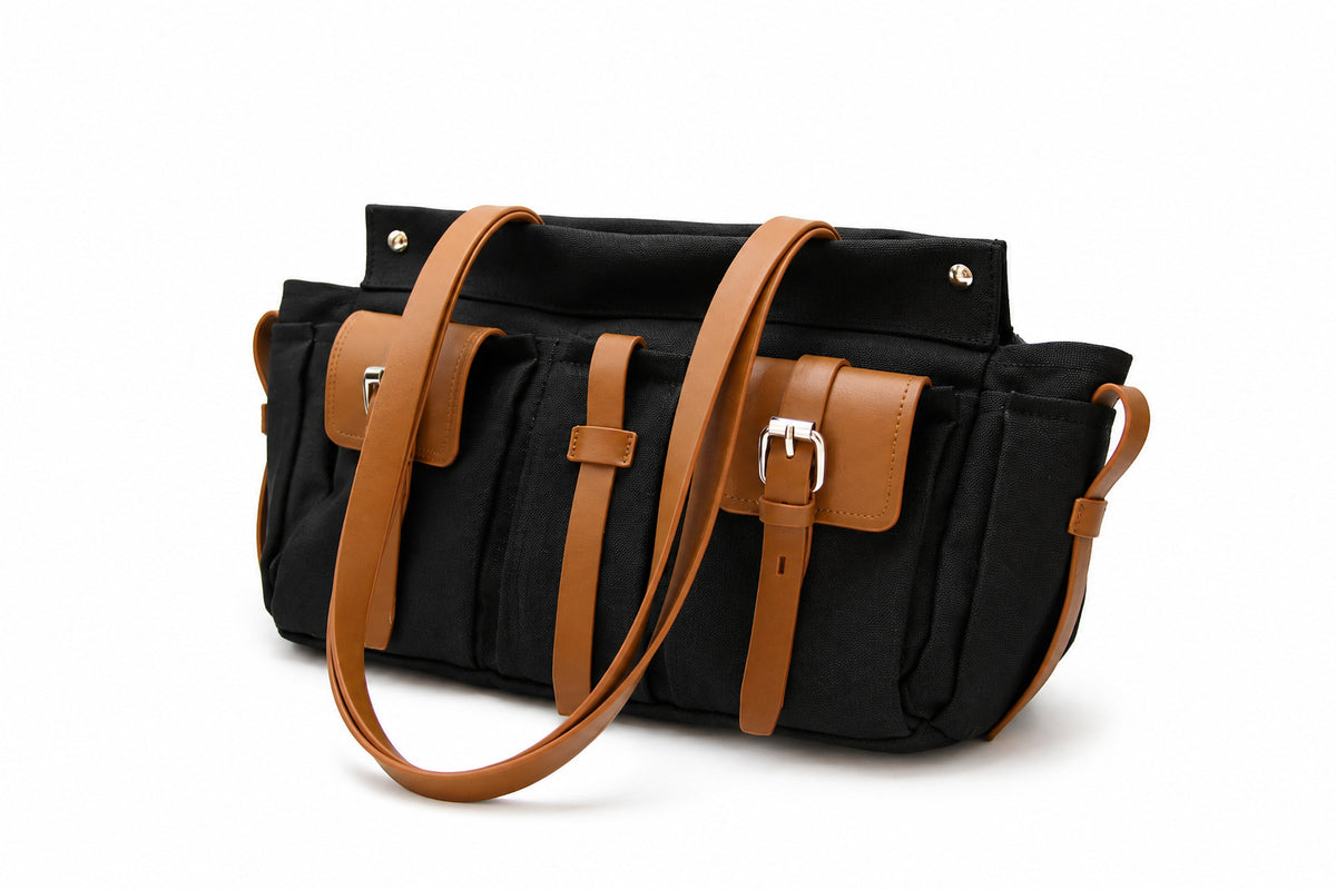 Large olive canvas shoulder tote bag with multiple front buckle-strap pockets and dark brown leather-look trim, detail view 7