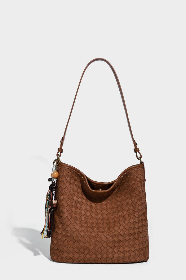 Dark chocolate woven texture hobo shoulder bag with multicolor tassel-and-bead charm and long adjustable strap, detail view