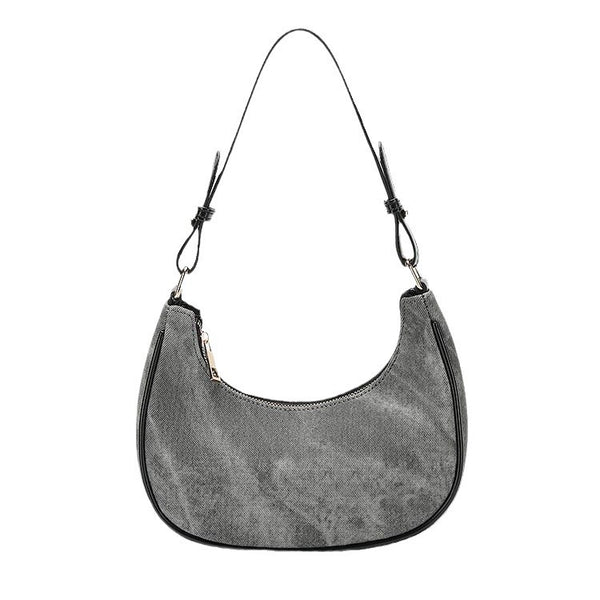 Small gray crescent half-moon shoulder bag with black leather-look trim, gold-tone zipper, and adjustable slim strap, detail