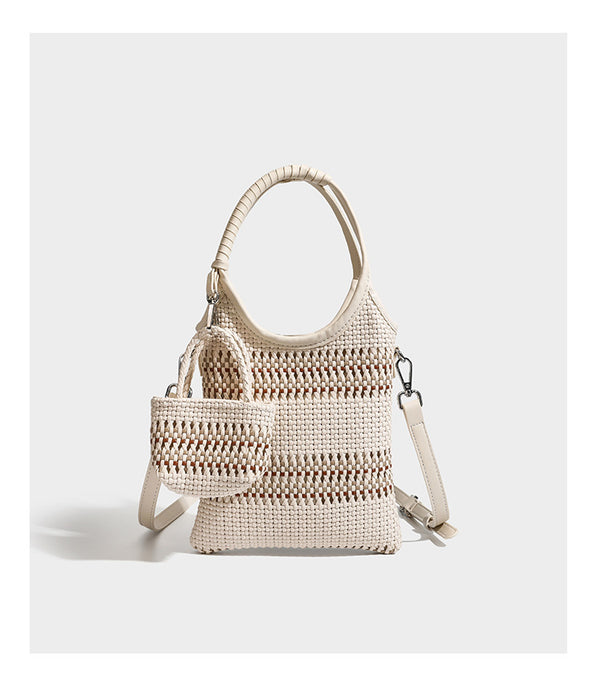 Brown two-tone woven leather-look shoulder bag with braided top handles, detachable mini pouch, and adjustable crossbody