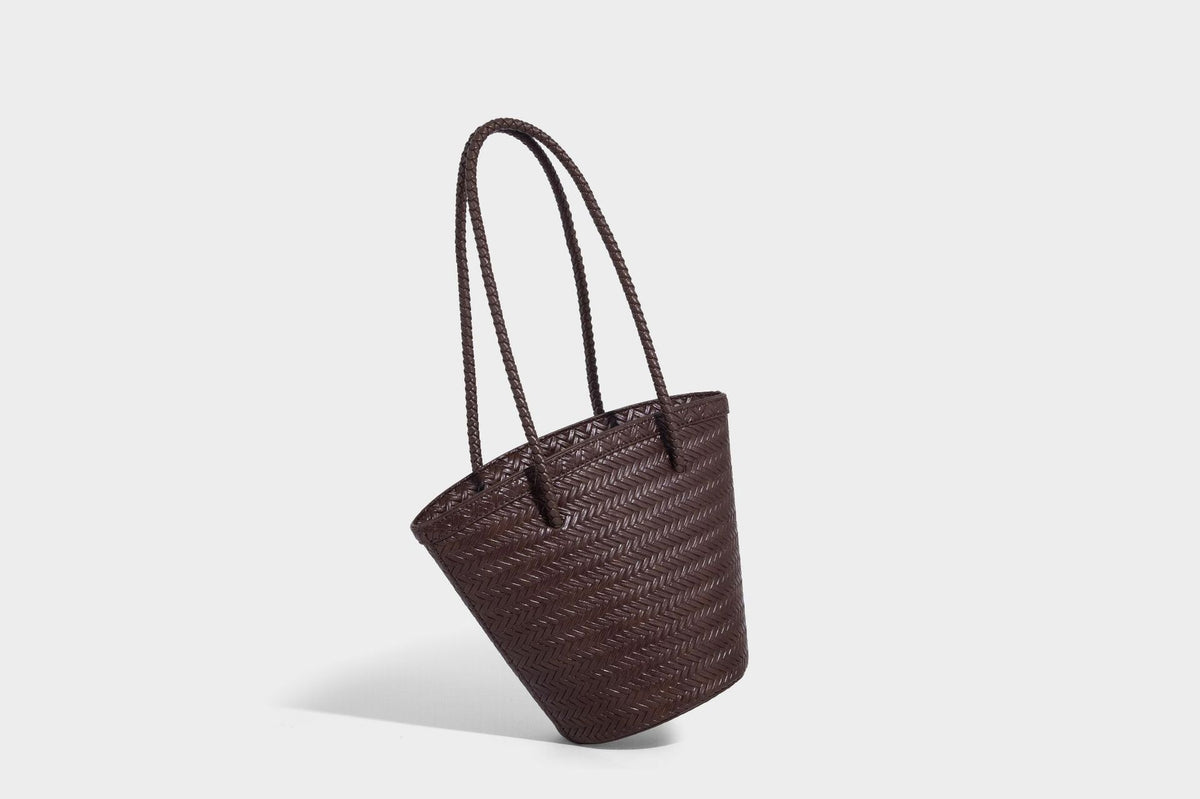Chevron-woven bucket tote bag with braided shoulder straps and matching drawstring pouch, detail view 25