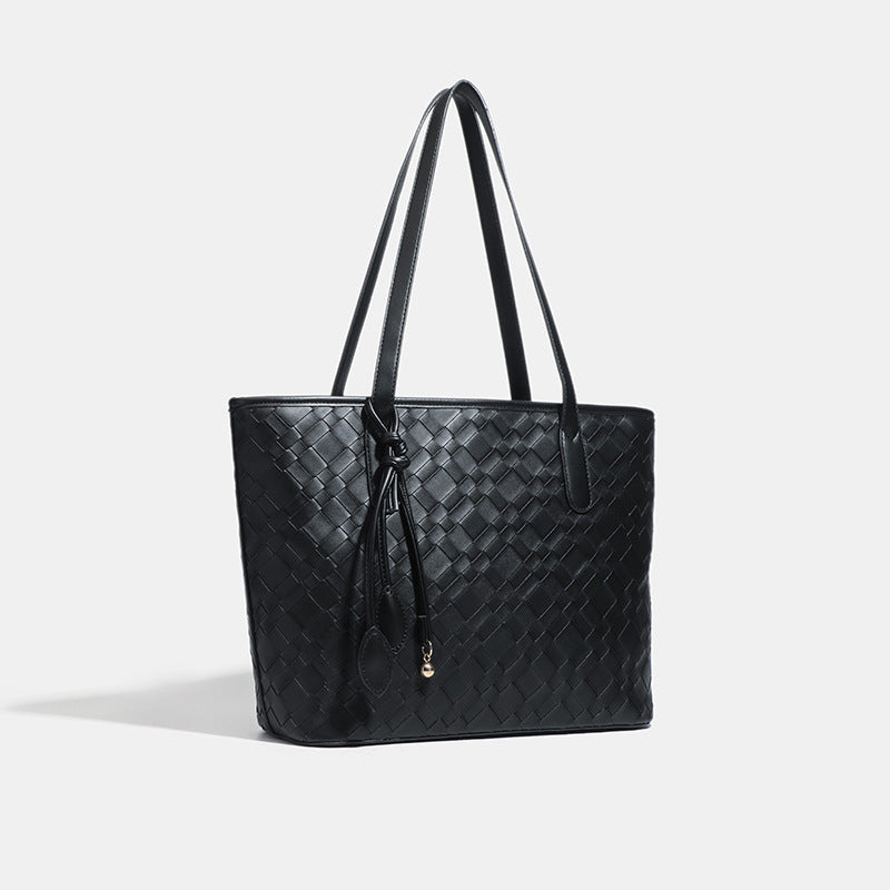 Structured woven-embossed leather-look tote bag with double shoulder straps and tassel charm, detail view 2