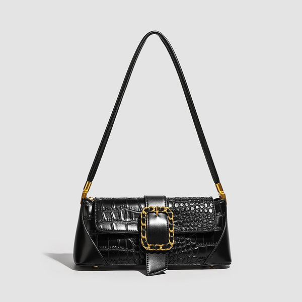 Crocodile-embossed leather-look baguette shoulder bag with gold-tone chain buckle closure and single shoulder strap, detail