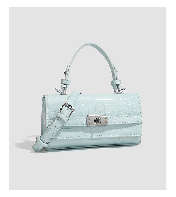 Mini-Umhängetasche mit strukturierter rechteckiger Form, glänzender Krokodilprägung in Lederoptik, Drehverschluss in Silberoptik und kurzem