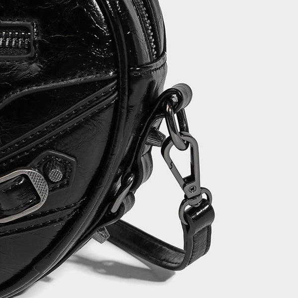 Mini heart-shaped crossbody bag with glossy crinkled finish and moto buckle hardware, detail view 23