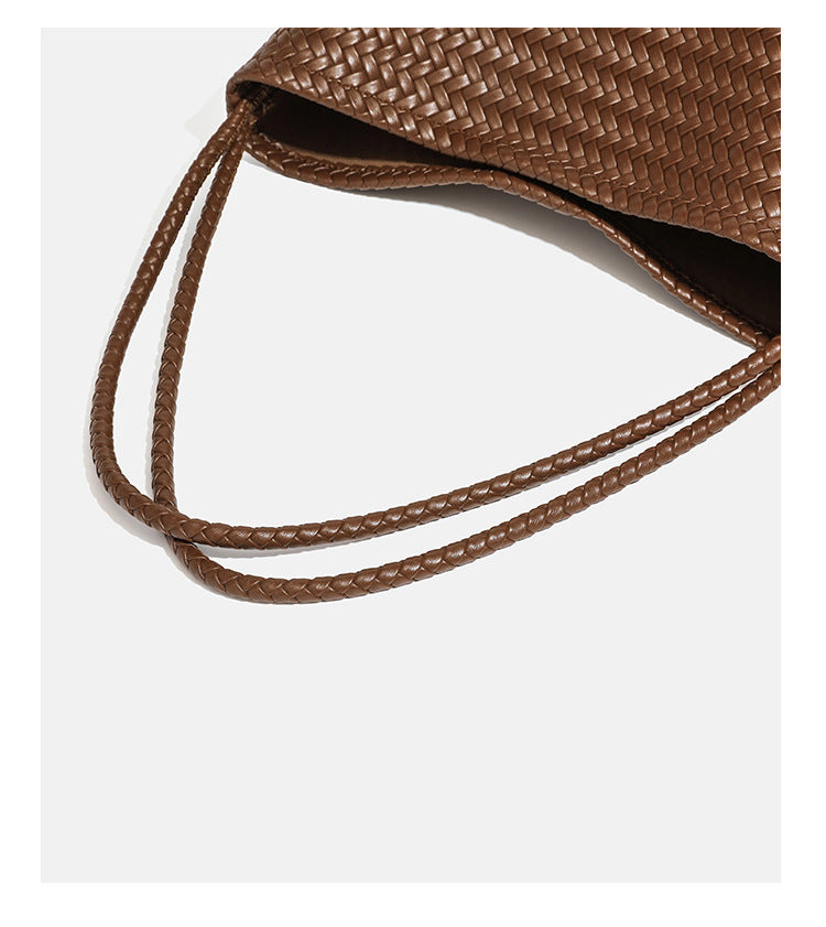 Woven leather-look hobo shoulder bag with braided strap and matching zip pouch, detail view 21