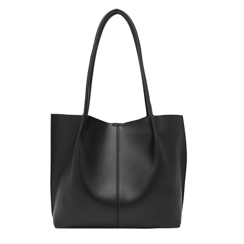 Large slouchy matte leather-look tote bag with double shoulder straps and centre seam detail, detail view 5
