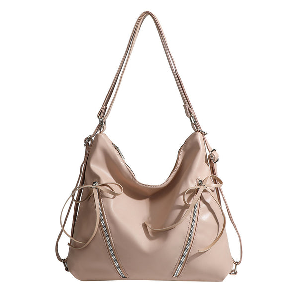 Slouchy hobo shoulder bag with bow detail and silver-tone hardware, detail view 5