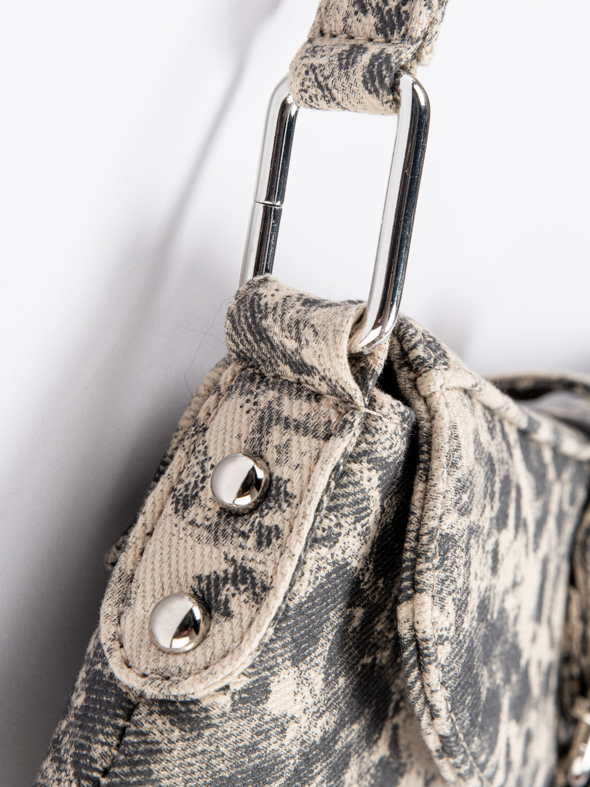 Small washed leopard print shoulder bag in blue-grey with silver buckle strap and stud accents, detail view 22