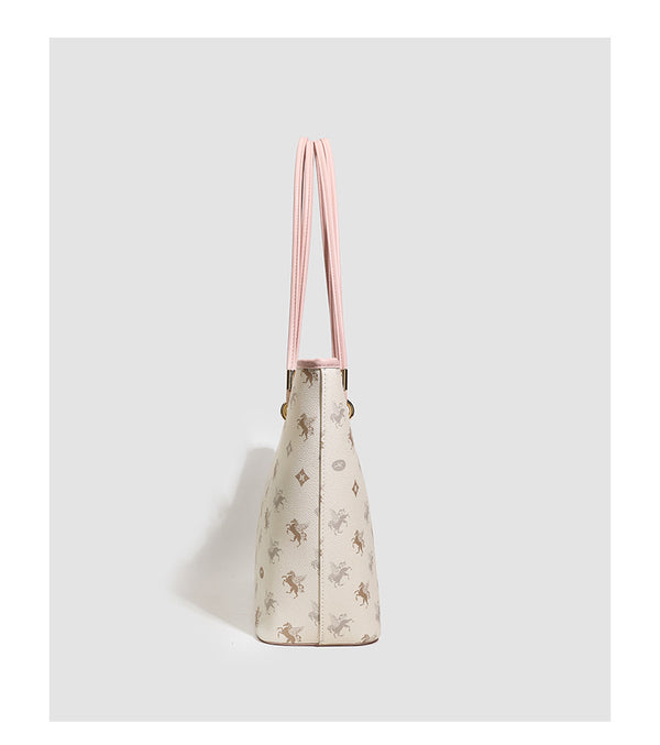 Cream structured tote bag with allover horse-and-crest print, blush-pink leather-look double shoulder straps, gold-tone