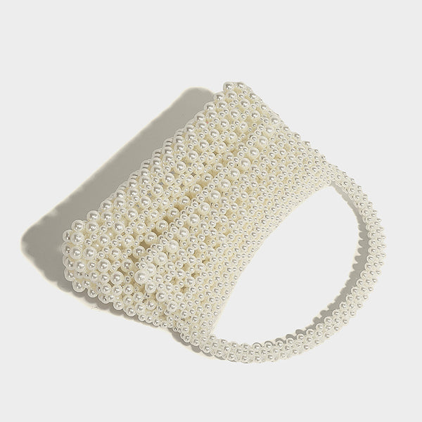 Elfenbeinfarbene Mini-Handtasche aus Kunstperlen mit geschwungenem Henkel und abnehmbarem silberfarbenem Kettenriemen, Detailansicht 22